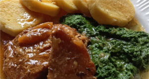 Perfect Lunch: Juicy Braised Pork Chop in Lard, Homemade Spinach and Honest Potato Dumplings Juicy braised pork chop with homemade spinach and potato dumplings