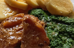 Perfect Lunch: Juicy Braised Pork Chop in Lard, Homemade Spinach and Honest Potato Dumplings Juicy braised pork chop with homemade spinach and potato dumplings