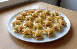 Forget Open Sandwiches: These Puff Pastry Stars with Garlic Spread Are Crunchy Bites with Ham, Cheese, and Cucumber Festive puff pastry stars with garlic spread, ham, cheese, and cucumber