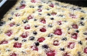 Raffaello Slices with Raspberries and Blueberries: Moist Coconut Cake with Whipped Cream Raffaello slices with raspberries and blueberries – moist coconut cake with whipped cream