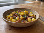 Roasted Potatoes with Bacon: An Easy One-Pan Lunch Roasted potatoes with bacon in a baking dish