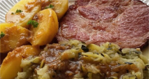 Roasted Smoked Pork Neck with Zucchini Cabbage: A Hearty Sunday Lunch Roasted smoked pork neck with boiled potatoes and zucchini cabbage in Moravian style