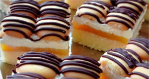 Viennese Dessert with Mascarpone: Refreshing Orange Layers and Chocolate Glaze Viennese dessert with delicious mascarpone cream – a treat to impress everyone