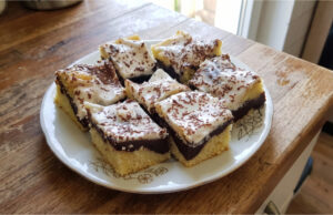 Zigzag Cake with Pudding and Sour Cream: Moist Dessert with Simple Decoration Zigzag cake with chocolate pudding and sour cream glaze