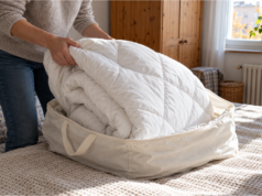 You Pulled Out Your Winter Duvet and It Smells Musty: When to Air It Out and When to Wash It Airing out a winter duvet on a drying rack