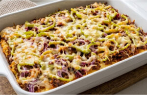 Baked Potato Pancake Without Frying: Crispy Treat for the Whole Family Baked potato pancake with cheese and vegetables on a tray