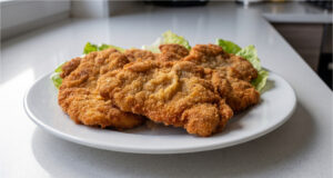 Chicken Cutlets in Mustard Marinade: Juicy Pan-Fried Meat Ready in Minutes Chicken cutlets in mustard marinade on a plate