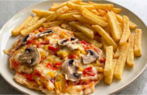 Chicken Cutlets Pizza Style: Juicy Meat with Cheese and Vegetables on One Tray Chicken cutlets pizza style with juicy meat, cheese, and vegetables on a tray