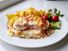 Farmer’s Layered Pork Chops: Juicy Meat with Bacon, Vegetables, and Golden Cheese Farmer's layered pork chops with bacon, vegetables, and melted cheese