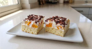 Homemade Florida Slices with Peaches: Moist Sponge, Delicate Cream, and Fluffy Whipped Cream Florida slices with peaches and whipped cream