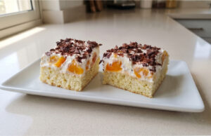 Homemade Florida Slices with Peaches: Moist Sponge, Delicate Cream, and Fluffy Whipped Cream Florida slices with peaches and whipped cream