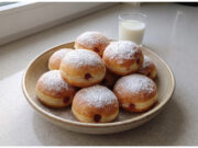 Homemade Jam-Filled Doughnuts: Fluffy Yeast Classic Fried to Golden Perfection Fluffy homemade doughnuts filled with jam and dusted with sugar