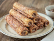 French Toast Rolls with Nutella: Crispy Breakfast with Cinnamon Sugar French toast rolls with Nutella and cinnamon for breakfast