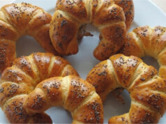 Homemade Buttery Crescent Rolls with Poppy Seeds: Fluffy Pastries with a Delicate Rum Aroma Homemade buttery crescent rolls with poppy seeds, fluffy like from a bakery