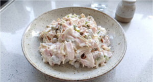 Homemade Parisian Salad: Creamy Czech Classic with Crunchy Pickles and Ham Homemade Parisian salad: Creamy Czech classic with crunchy pickles and ham