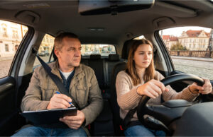 I Failed My Driving Test for the Sixth Time. My Family Is Afraid to Ask How It Went Instructor watching the student drive.
