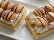Viennese Dessert with Orange Pudding: Moist Layers with Mascarpone and Rum-Soaked Ladyfingers Luxury Viennese layered dessert with orange pudding and mascarpone