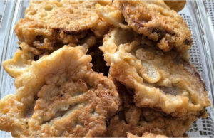 Meatloaf in Cheese Batter: Quick Fried Slices with Bread and Cucumber Meatloaf slices fried in cheese batter served with bread and cucumber