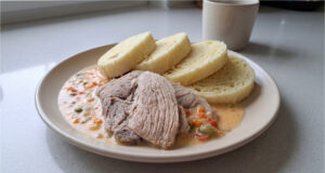 Old Bohemian Sauce with Boiled Pork Shoulder: Tender Meat and a Balanced Sweet and Sour Flavor Old Bohemian sauce with pork shoulder served with dumplings