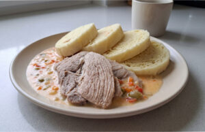 Old Bohemian Sauce with Boiled Pork Shoulder: Tender Meat and a Balanced Sweet and Sour Flavor Old Bohemian sauce with pork shoulder served with dumplings