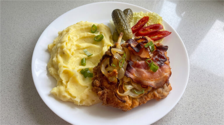 Reverse Pork Neck Schnitzels: Juicy Meat Baked with Onions and Bacon