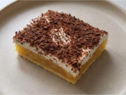 Royal Apple Dessert with Whipped Cream: Delicate Layers Crowned with Grated Chocolate Royal apple dessert with whipped cream and grated chocolate