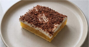 Royal Apple Dessert with Whipped Cream: Delicate Layers Crowned with Grated Chocolate Royal apple dessert with whipped cream and grated chocolate