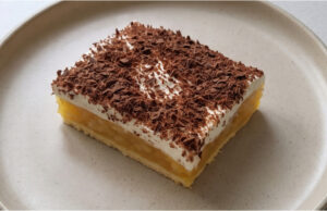 Royal Apple Dessert with Whipped Cream: Delicate Layers Crowned with Grated Chocolate Royal apple dessert with whipped cream and grated chocolate