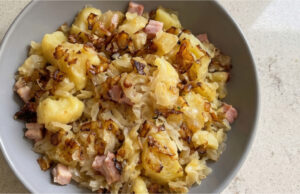 Do You Know Uhlířina? A Traditional Czech Dish of Potatoes, Dumplings, and Sauerkraut That Was Almost Forgotten Traditional Czech uhlířina with potatoes, dumplings, sauerkraut, and smoked pork belly served in a bowl