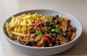 Pork Stir-Fry with Fries: Juicy Meat, Crunchy Vegetables, and Easy Preparation Tip for the weekend: Pork stir-fry with fries that tastes like from a real restaurant